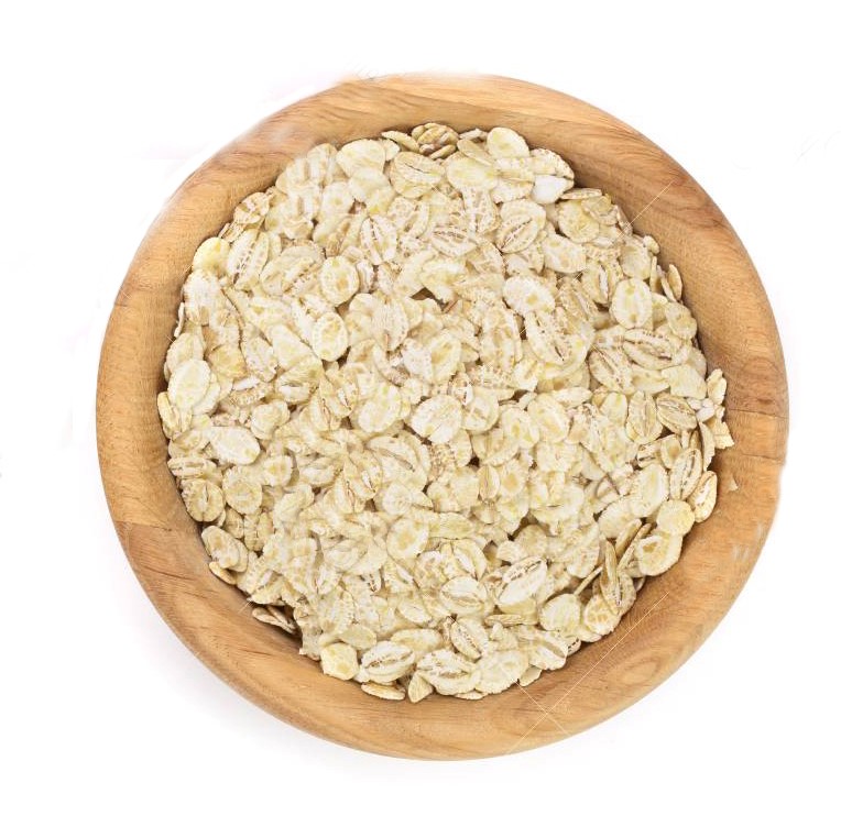oat spike with oat flakes in wooden bowl isolated on white background.